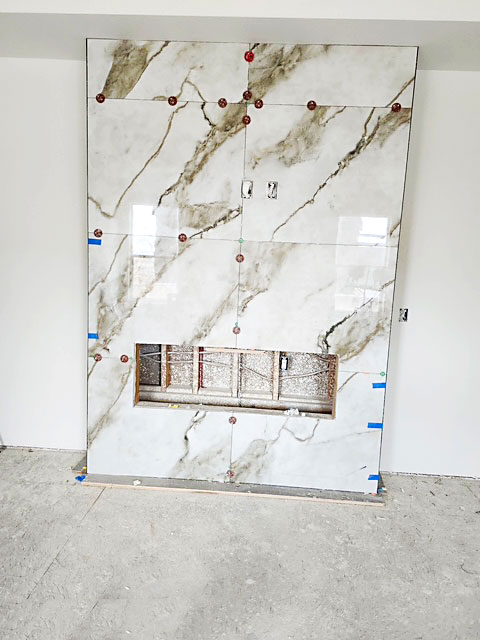 Custom granite tile fireplace